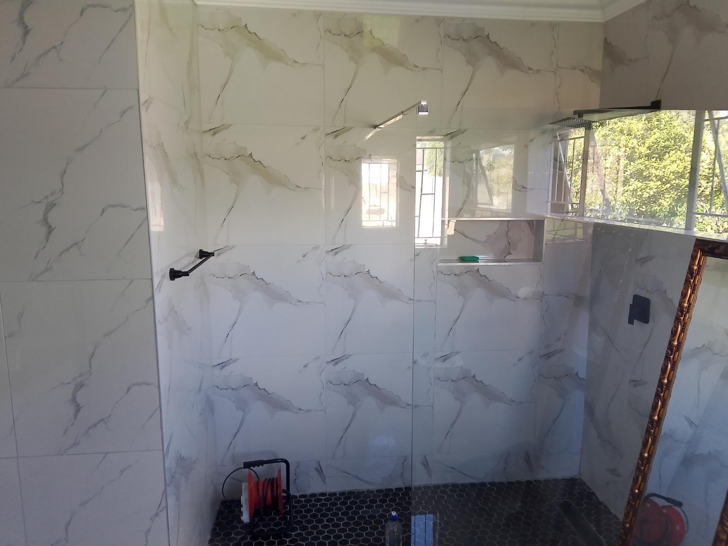 Walk-in shower, black hex mosaic